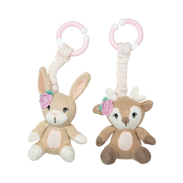 Two knitted animal toys, one resembling a rabbit and the other a deer, with pink floral accents on a white background.