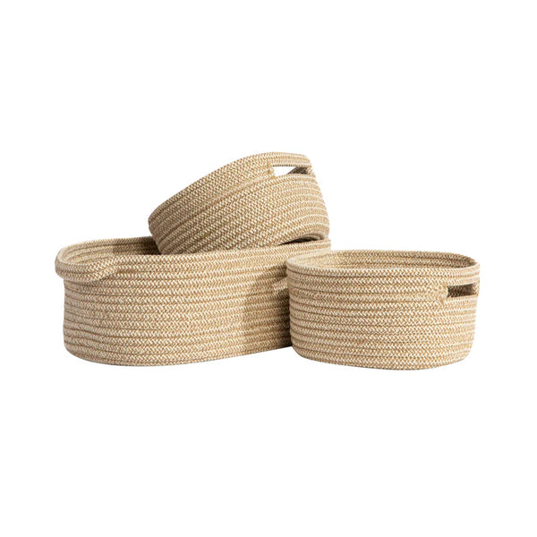 Set of three woven baskets on a white background