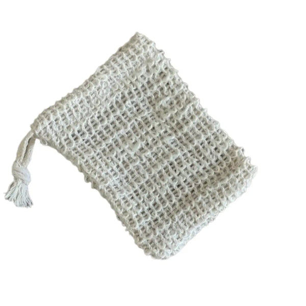 Woven soap bag with a tassel on a white background