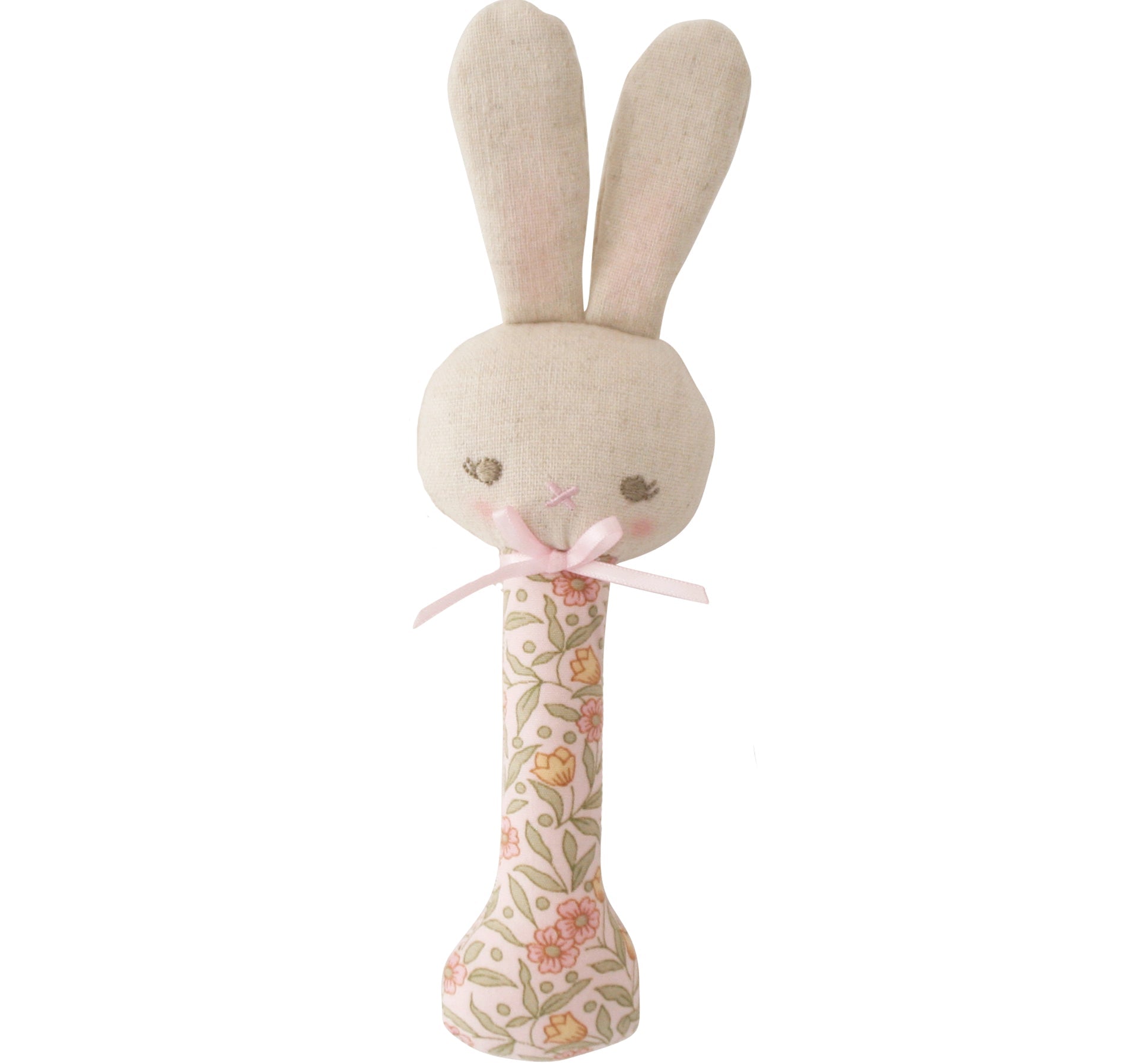 Stuffed bunny toy with floral patterned handle on a white background