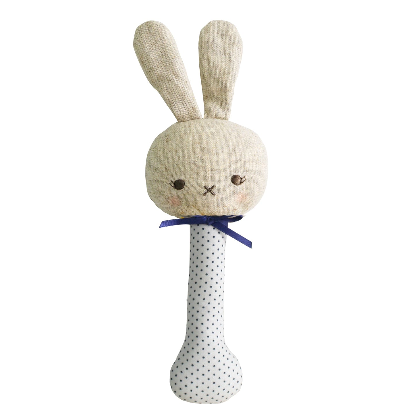 Textured bunny rattle with a polka dot handle on a white background