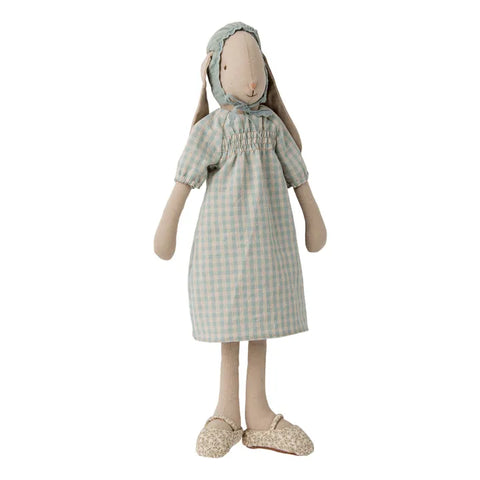 Stuffed Maileg toy rabbit in a checkered dress on a white background