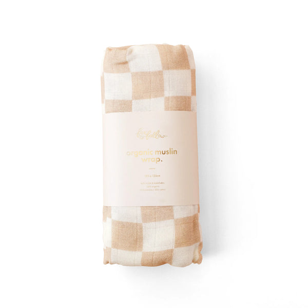 Checkered muslin wrap with brand name on a white background