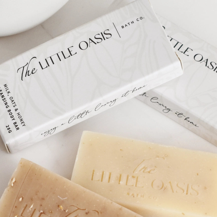 The Little Oasis bath bar with packaging on a light background