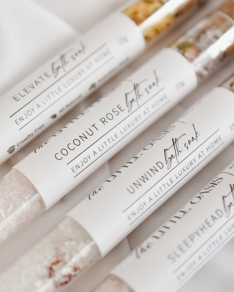 Bath soaks with labels on a light background