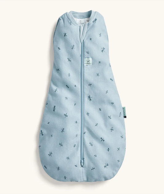Blue baby sleeping bag with dragonfly pattern on a white background