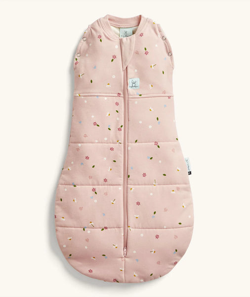 Pink baby sleeping bag with floral pattern on a white background