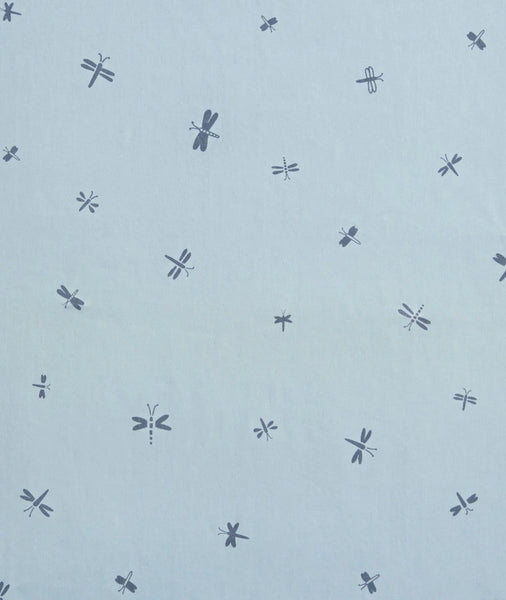 Pattern of dragonflies on a light blue background