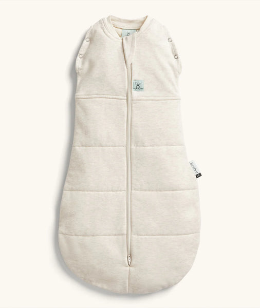 Beige baby sleeping bag with buttons on a white background