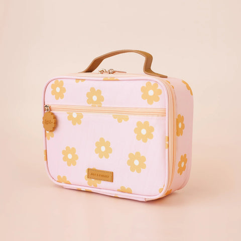 Pink lunch bag with yellow flower pattern on a beige background