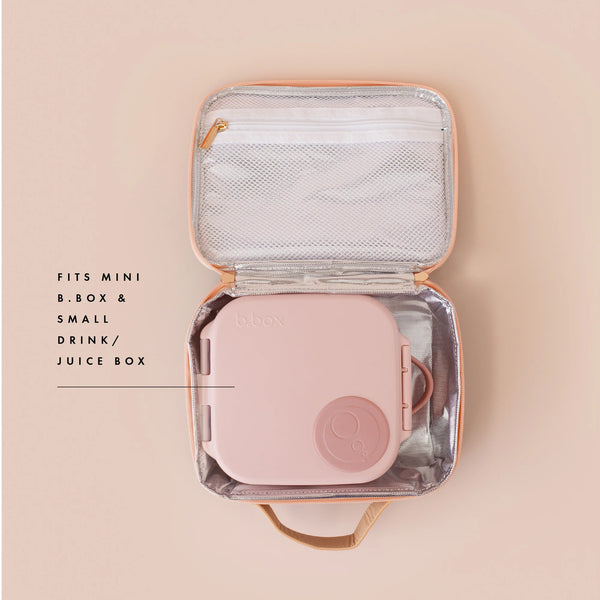 Pink lunch box case with a mesh interior on a beige background