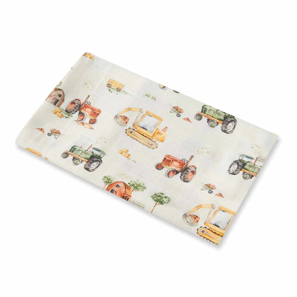 Fabric with construction vehicle pattern on a white background