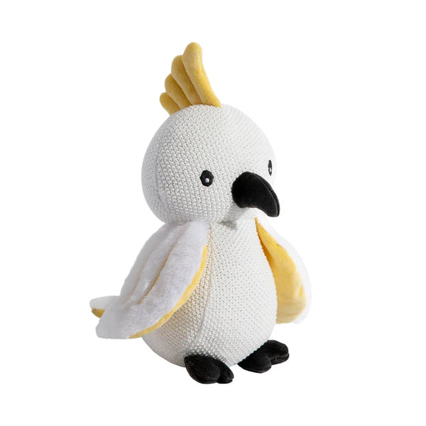 Crocheted parrot toy with white body, yellow crest, and black beak on a white background