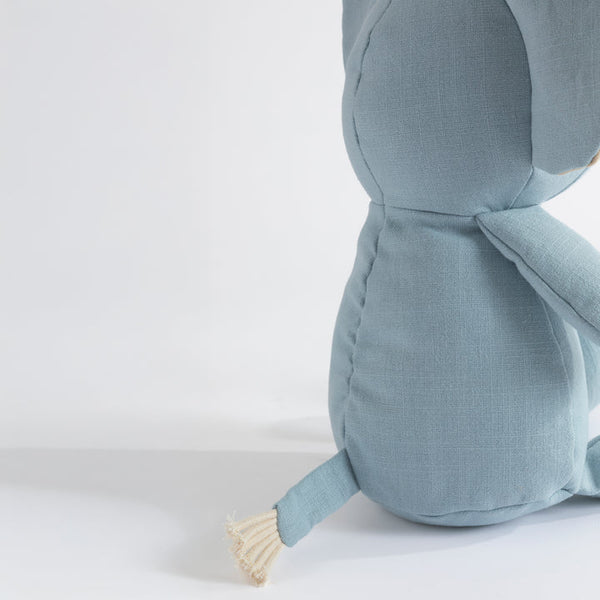 Light blue plush toy elephant on a white background