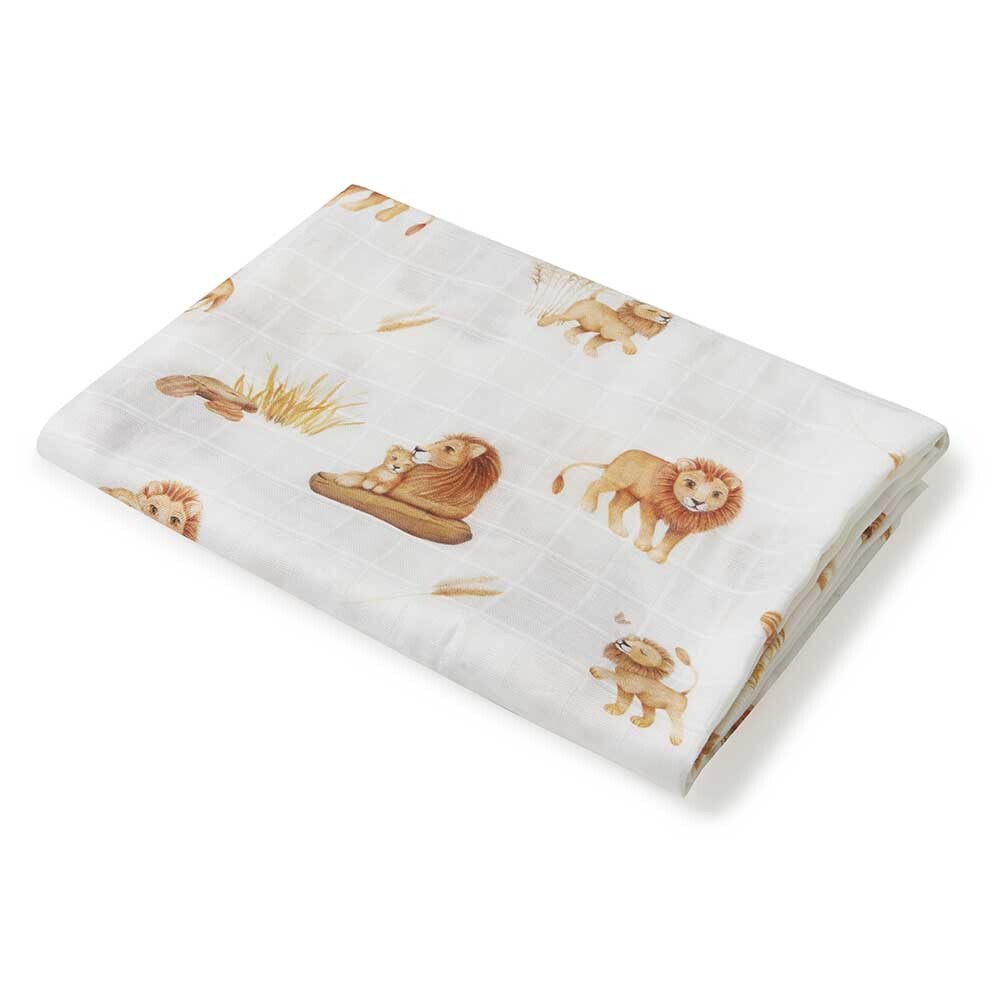 Muslin blanket with lion prints on a white background