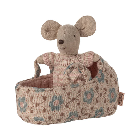 Stuffed mouse toy with floral patterned basket on a white background