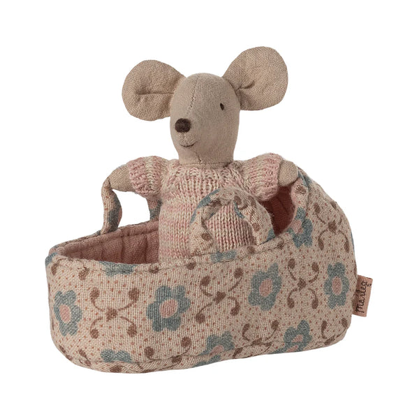Stuffed mouse toy with floral patterned basket on a white background
