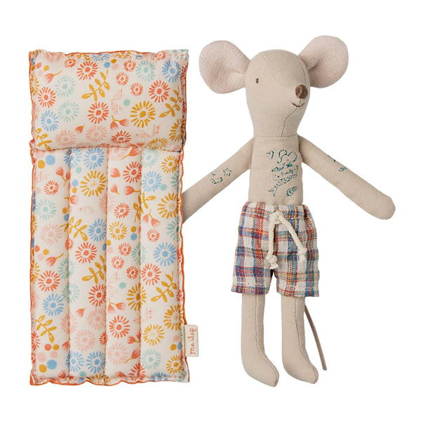 Stuffed mouse toy with floral-patterned pillow on a white background