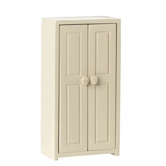 Beige two-door cabinet on a white background