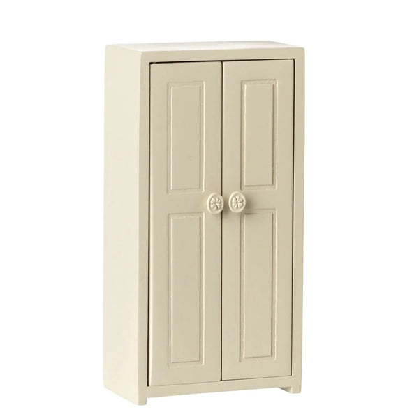 Beige two-door cabinet on a white background