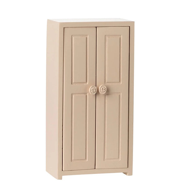 Beige two-door cabinet on a white background