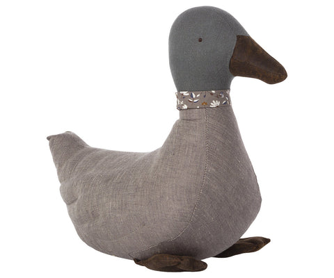 Gray fabric duck with a brown beak on a white background