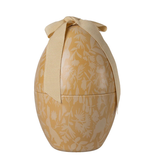 Decorative egg-shaped container with floral pattern and beige ribbon on a white background