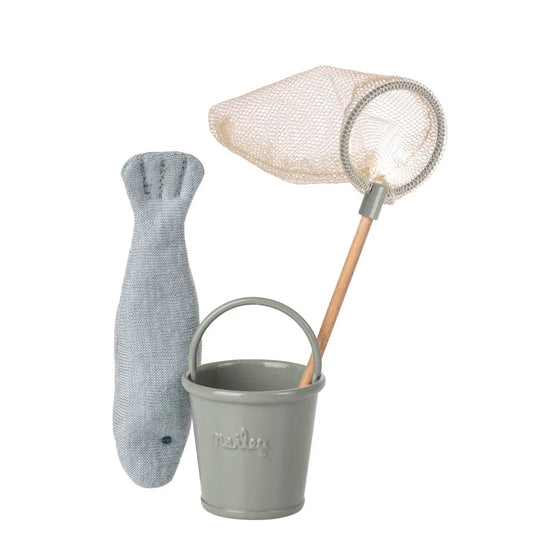 Toy fishing set with a fish, bucket, and net on a white background