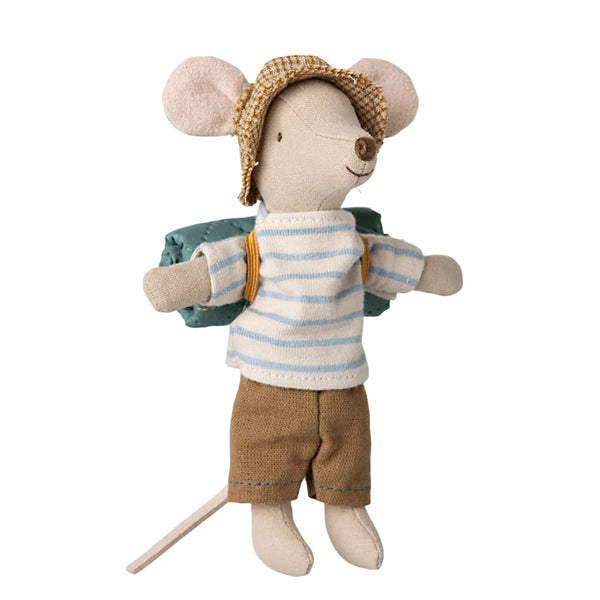 Stuffed toy mouse in a striped sweater and shorts with a backpack on a white background