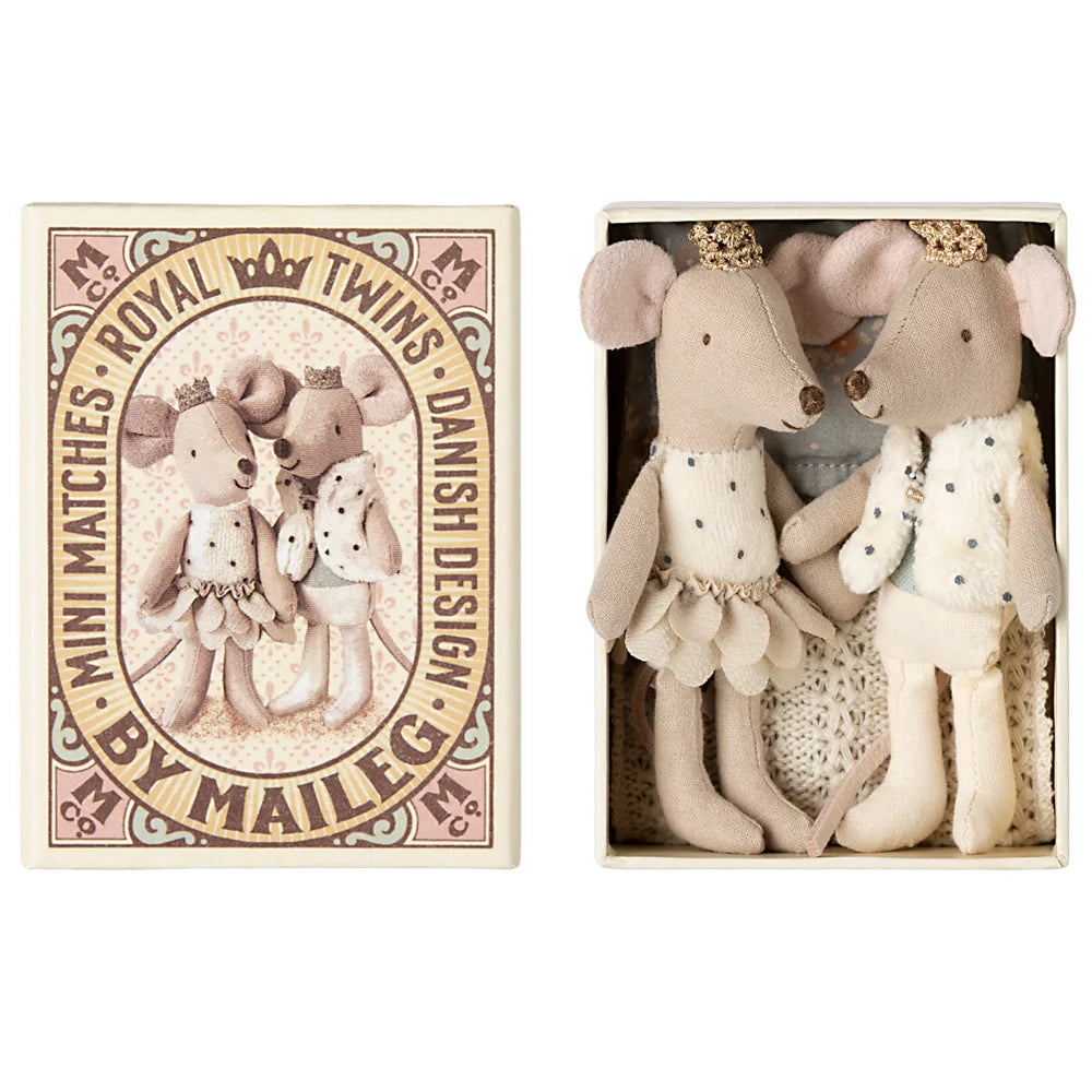 Two Maileg toy twin mice in a matchbox with decorative packaging on a white background