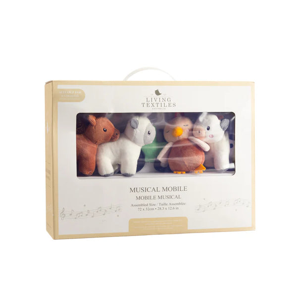 Living Textiles musical mobile packaging with toy animals on a white background