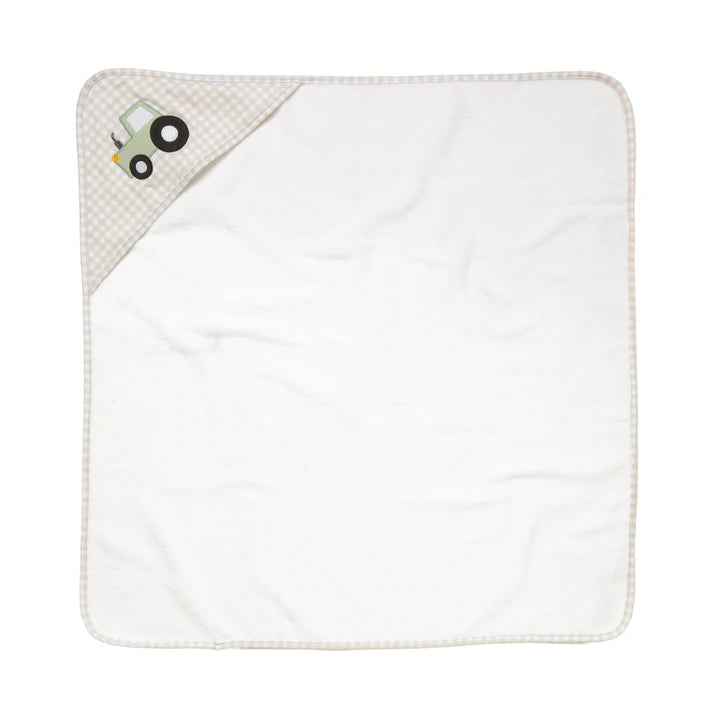White baby blanket with a textured corner and cartoon character on a white background