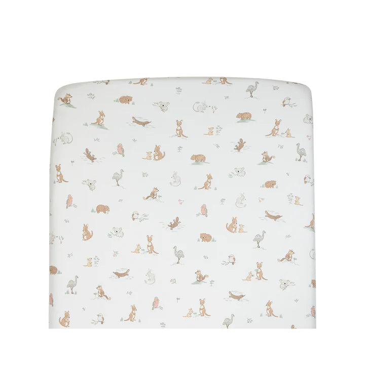 Fitted crib sheet with animal pattern on a white background