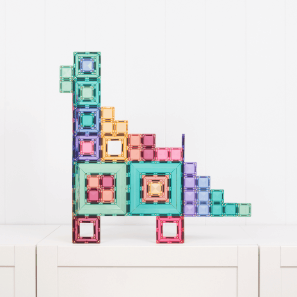 Colorful geometric block puzzle on a white surface