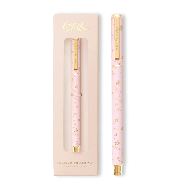 Pink roller pen with gold accents in a matching packaging box on a white background