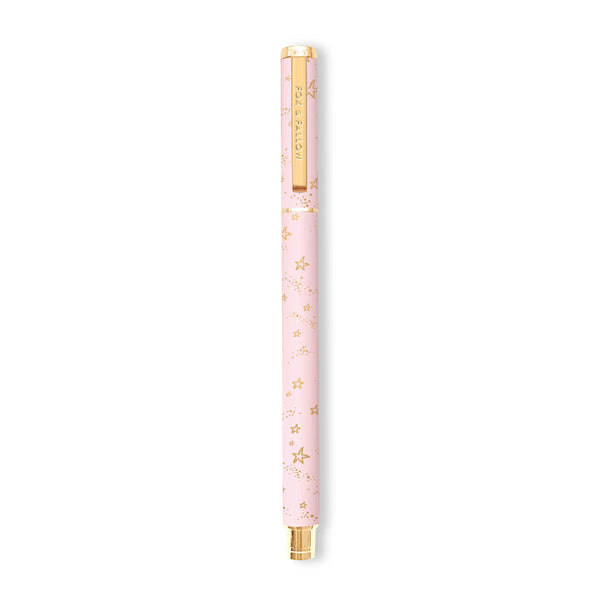 Pink pen with gold accents on a white background