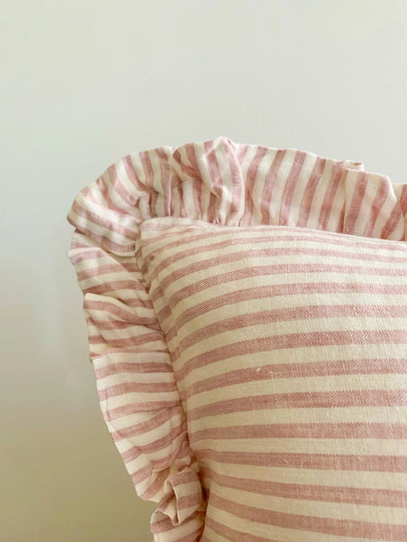 Striped fabric with pink and beige horizontal lines on a light background