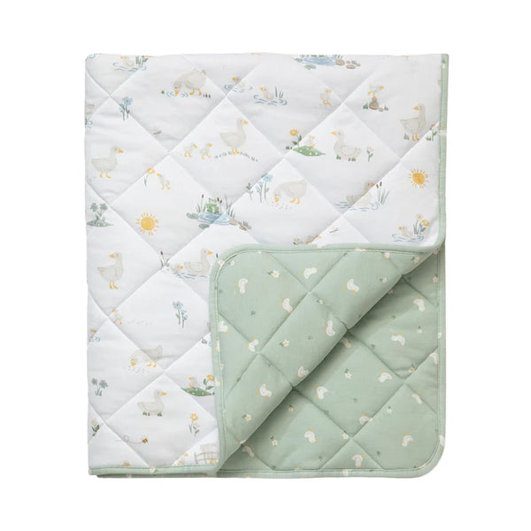 Quilted baby blanket with floral pattern on a white background