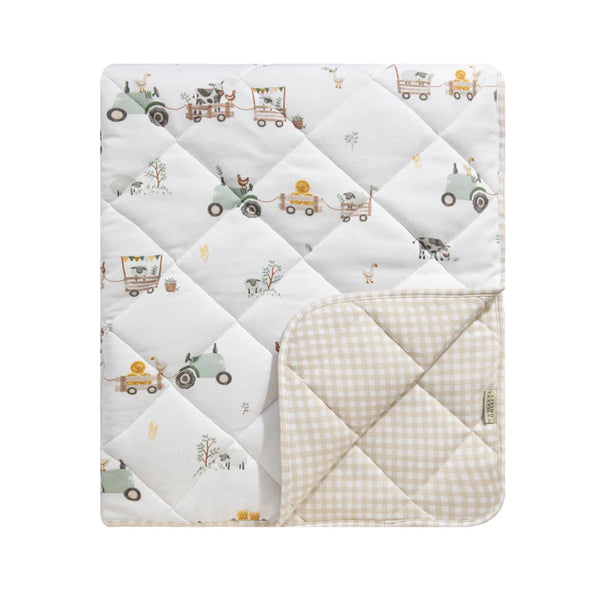 Quilted baby blanket with car pattern on a white background