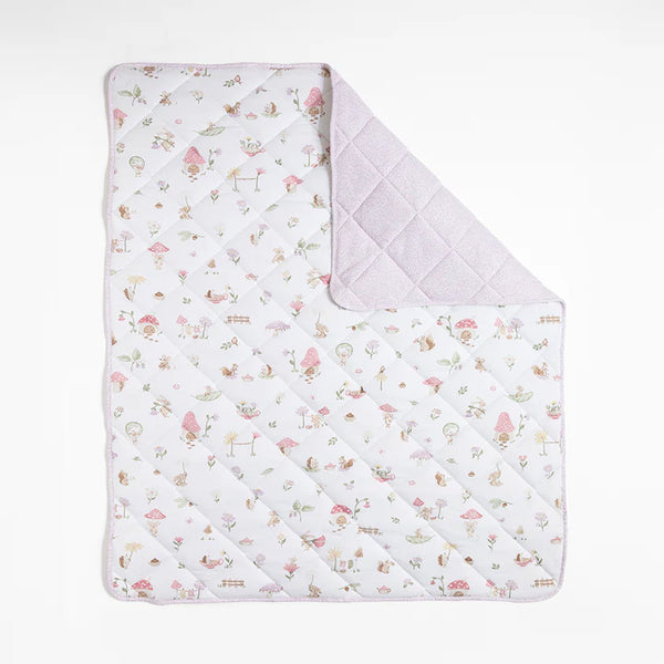 Quilted baby blanket with a floral pattern on a white background