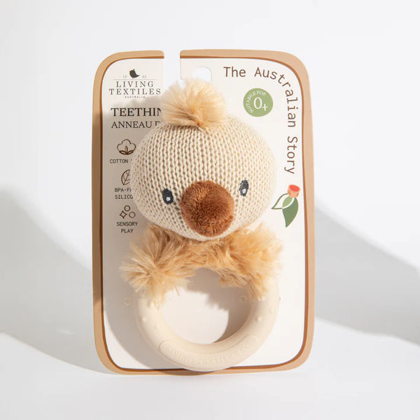 Teething ring with lion design in packaging on a white background
