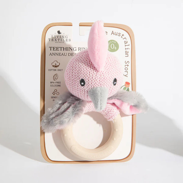 Pink mouse-shaped teething ring with packaging on a white background