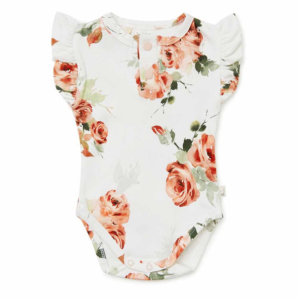 Floral-patterned baby onesie on a white background