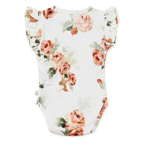 Floral-patterned baby romper on a white background