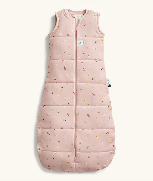 Pink baby sleeping bag with floral pattern on a white background