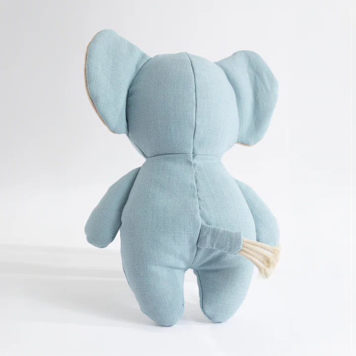 Light blue stuffed elephant toy on a white background