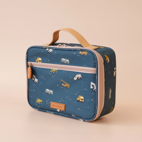 Blue lunch bag with construction vehicle pattern on a beige background