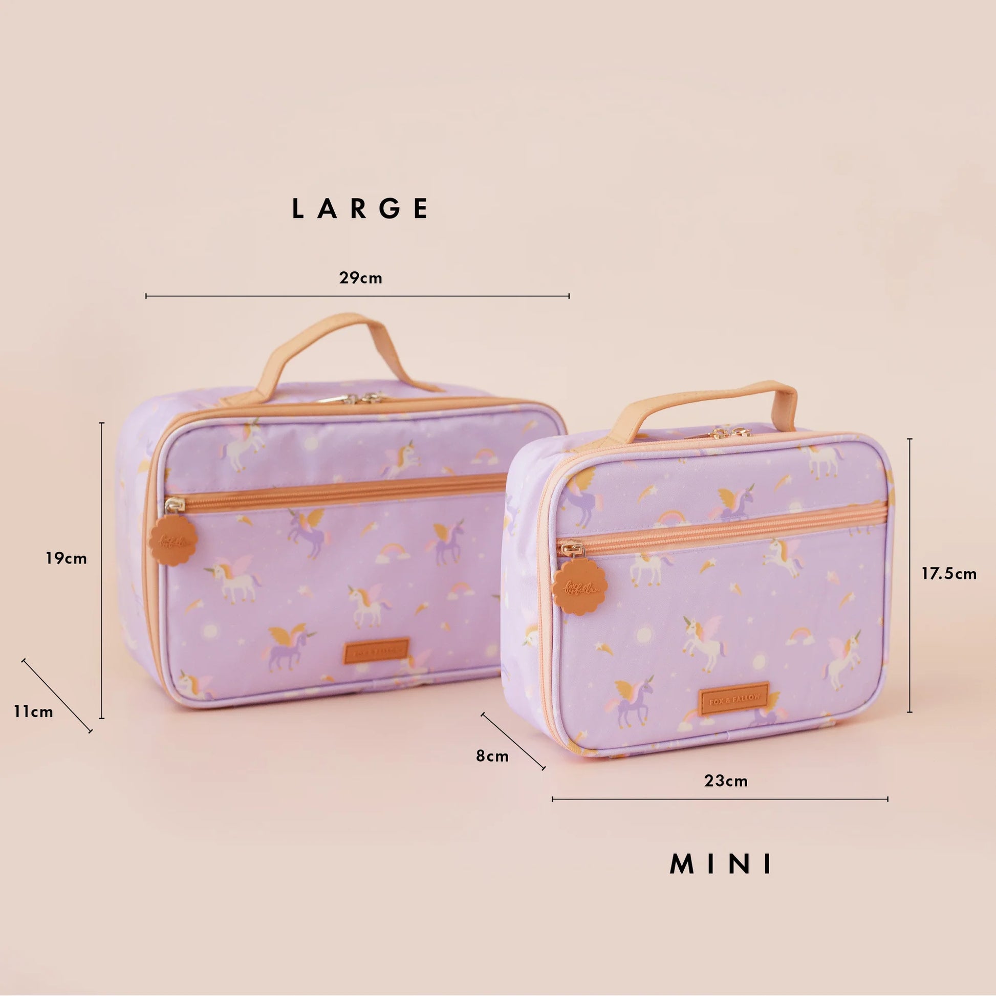 Two purple lunch bags with unicorn pattern and measurements on a beige background