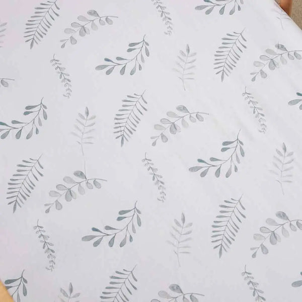 White fabric with gray leaf pattern