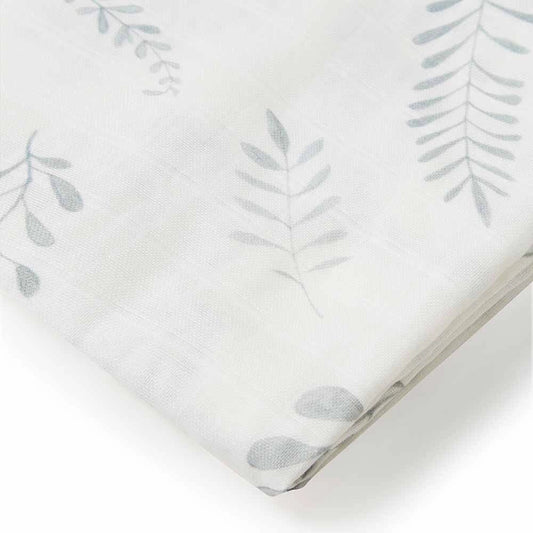 Fitted sheet with subtle leaf pattern on a white background